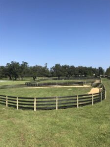 Large ranch rail farm fencing installation on multi-acre property in North Central Florida